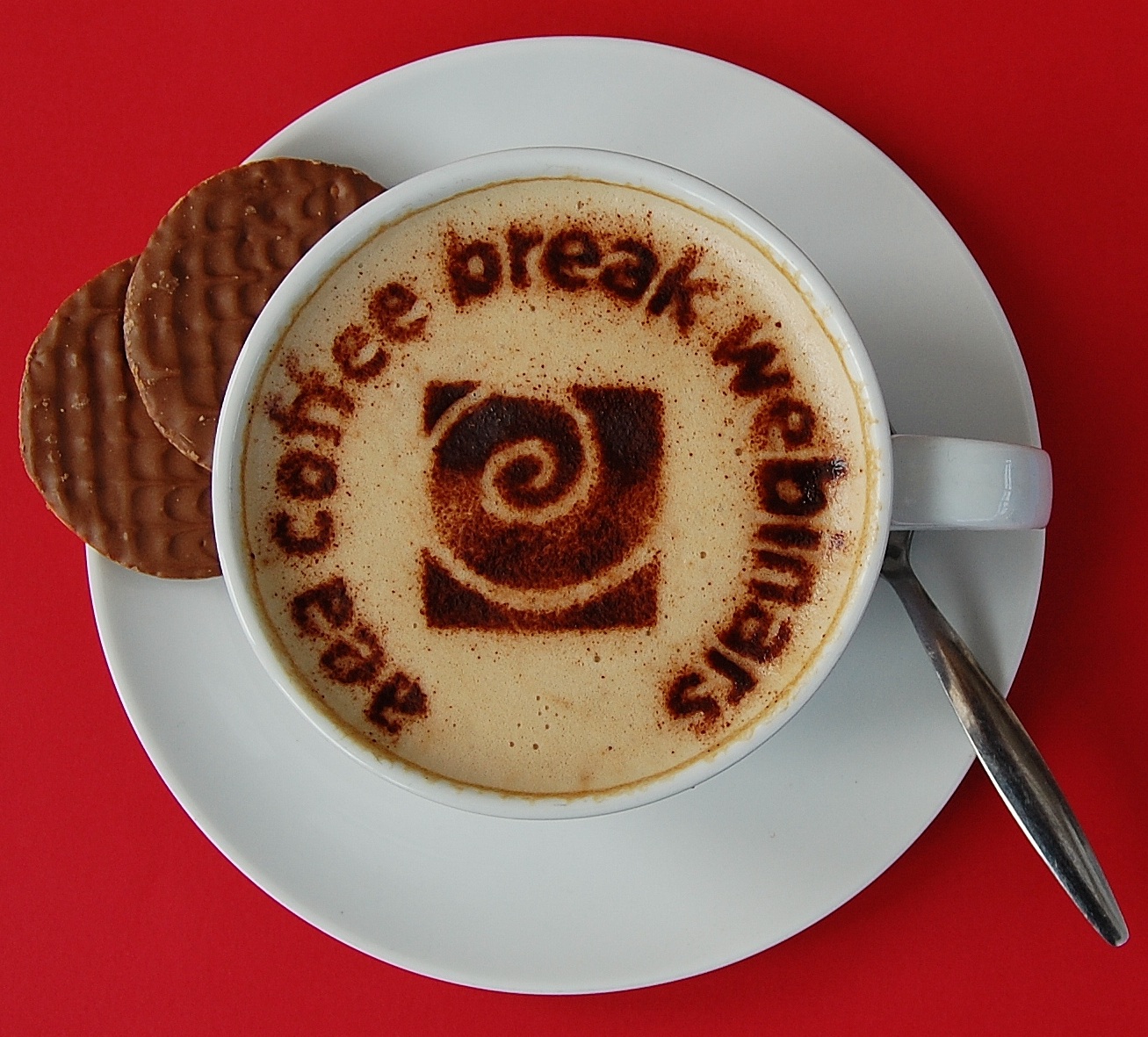 Picture of a cup of coffee with "AEA Coffee Break Webinars" written in the coffee itself.